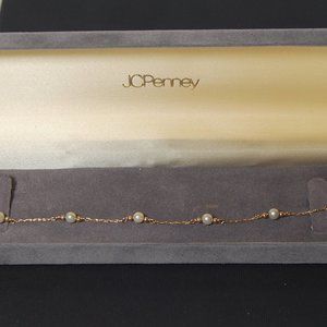 14kt Gold bracelet with pearls. 7" length